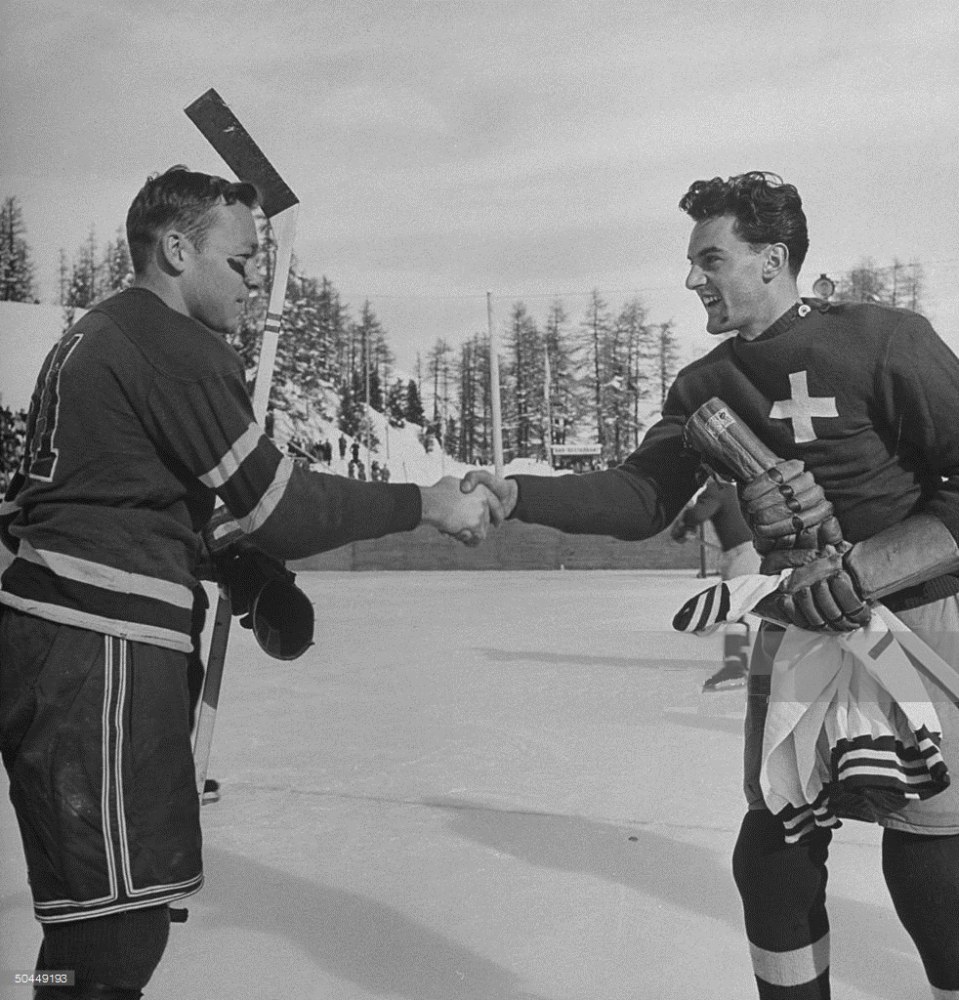 Photo:Swiss and American Captains Exchange Jerseys  in Ice Hockey Day 1 of 1948 Winter Olympics